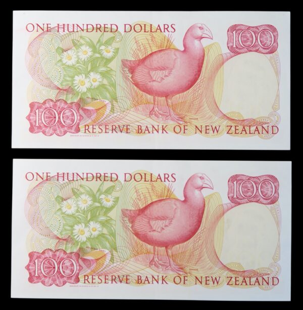 Red 100 dollar banknote queen elizabeth