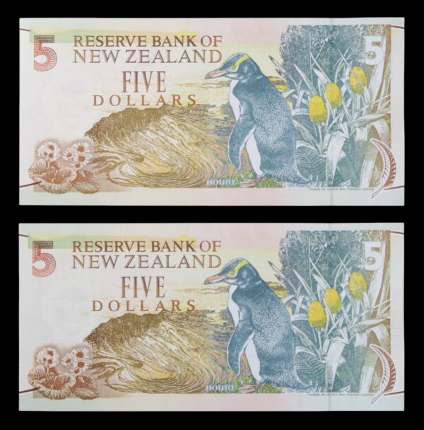 Five dollars with yellow eyed penguin