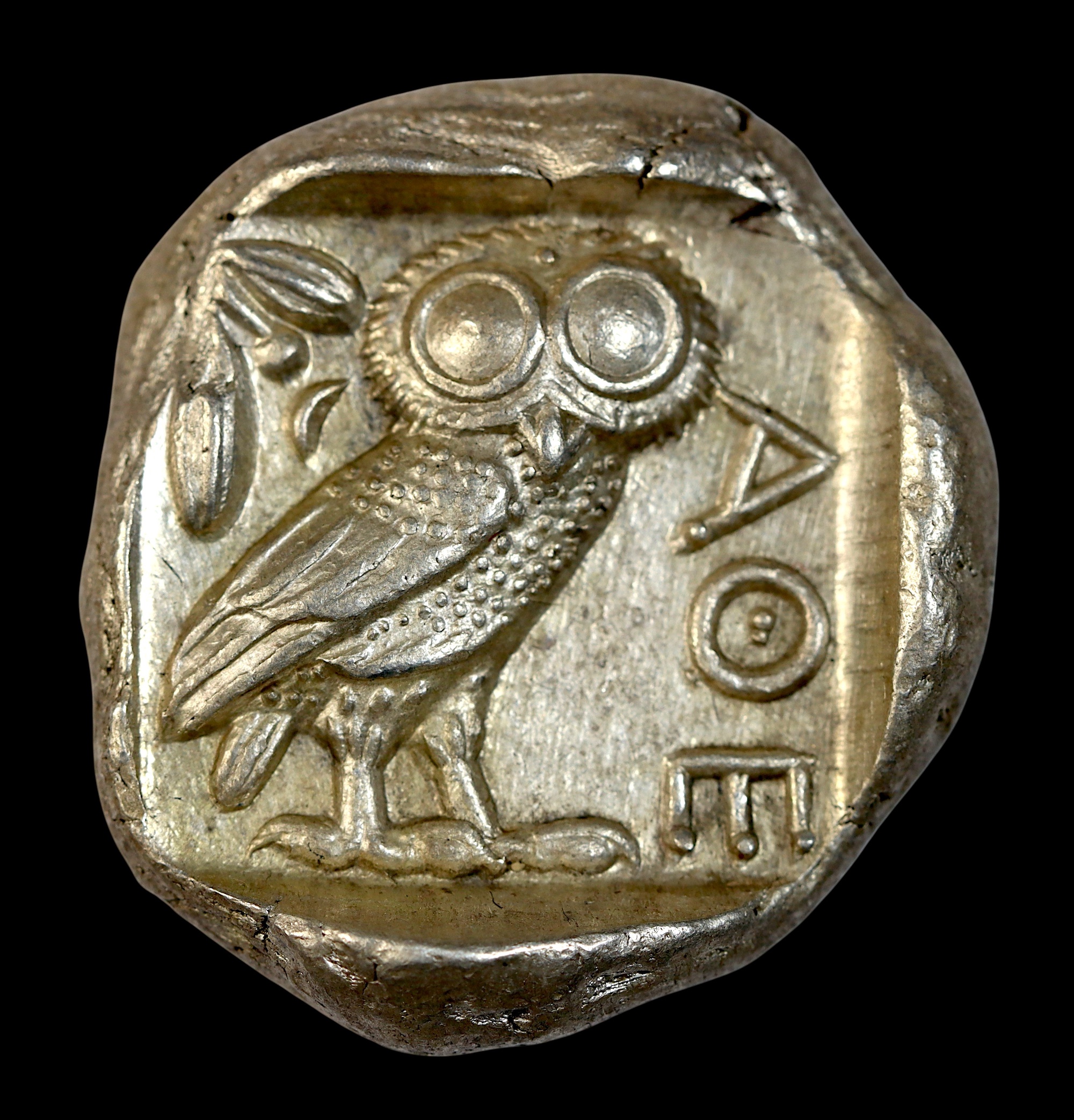 Ancient Greek silver coin with the owl of wisdom